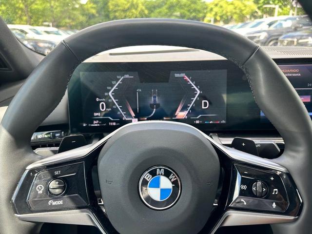 Photo of 2024 Black Sapphire Metallic BMW 530