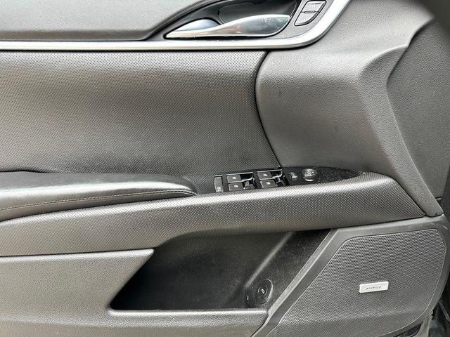 Photo of 2016 Black Raven Cadillac XTS