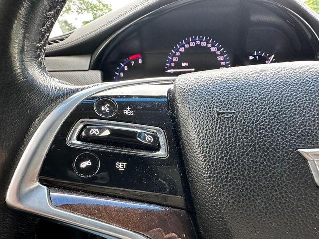 Photo of 2016 Black Raven Cadillac XTS