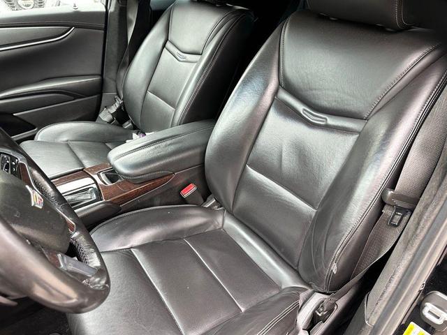 Photo of 2016 Black Raven Cadillac XTS