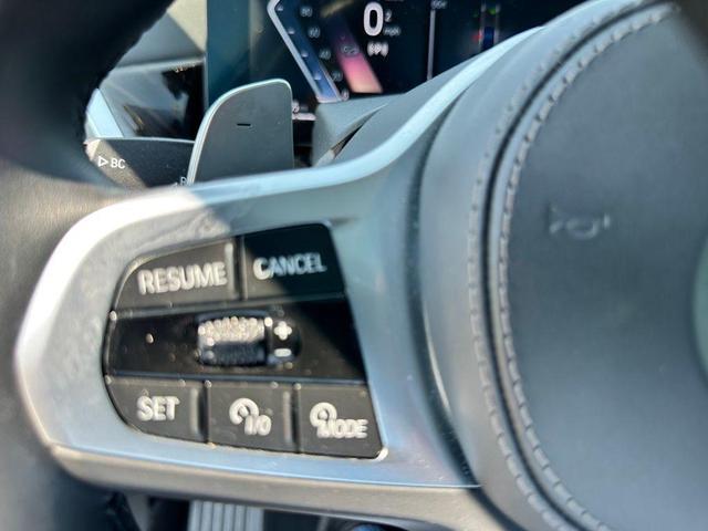 Photo of 2025 Carbon Black Metallic BMW X6