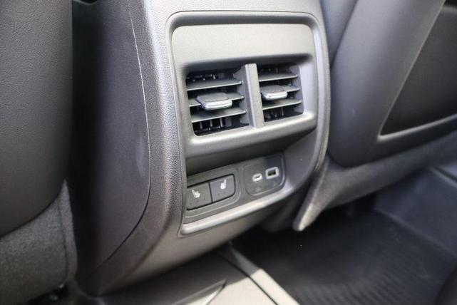 Photo of 2024 Argent Silver Metallic Cadillac XT4