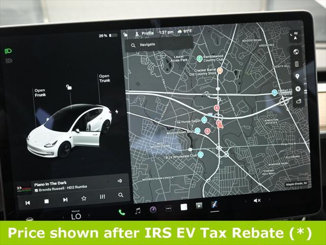 Photo of 2021 Pearl White Multi-Coat Tesla Model 3