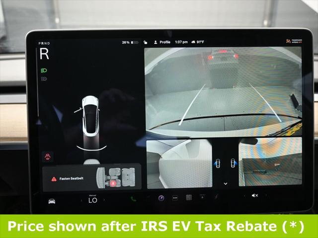 Photo of 2021 Pearl White Multi-Coat Tesla Model 3