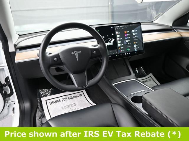Photo of 2021 Pearl White Multi-Coat Tesla Model 3