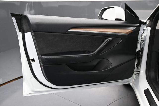 Photo of 2021 Pearl White Multi-Coat Tesla Model 3