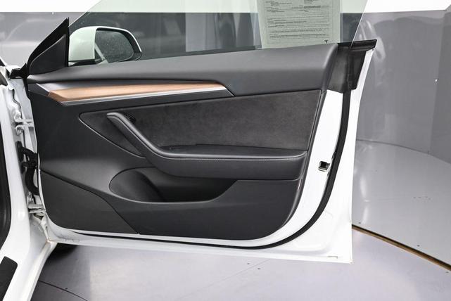 Photo of 2021 Pearl White Multi-Coat Tesla Model 3