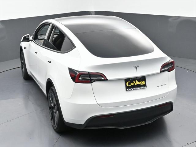 Photo of 2024 Pearl White Multi-Coat Tesla Model Y