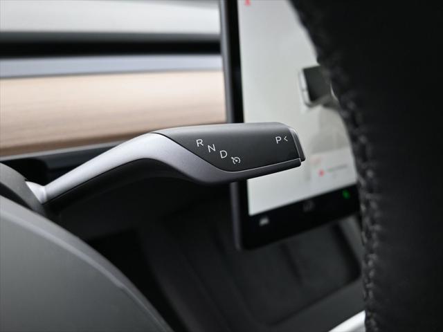 Photo of 2024 Pearl White Multi-Coat Tesla Model Y