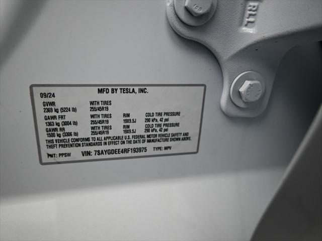Photo of 2024 Pearl White Multi-Coat Tesla Model Y