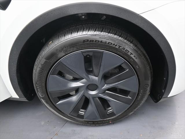 Photo of 2024 Pearl White Multi-Coat Tesla Model Y