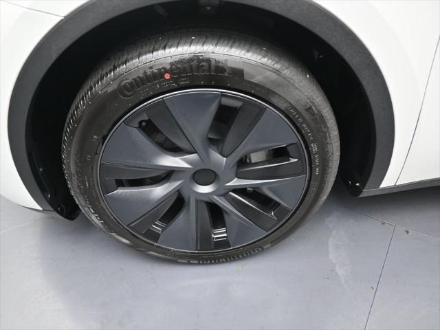Photo of 2024 Pearl White Multi-Coat Tesla Model Y