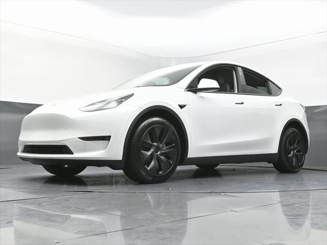 Photo of 2024 Pearl White Multi-Coat Tesla Model Y