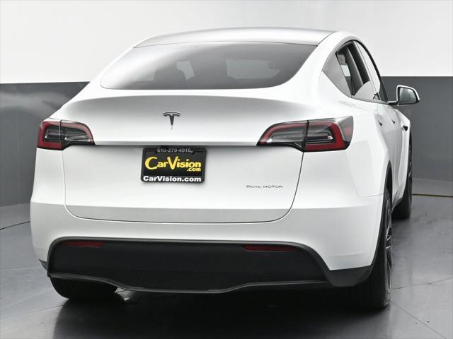 Photo of 2024 Pearl White Multi-Coat Tesla Model Y