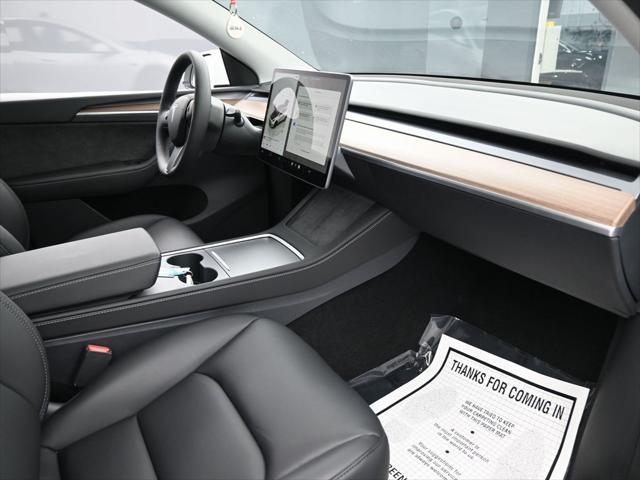 Photo of 2024 Pearl White Multi-Coat Tesla Model Y