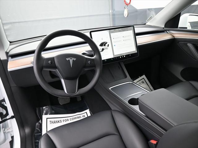 Photo of 2024 Pearl White Multi-Coat Tesla Model Y