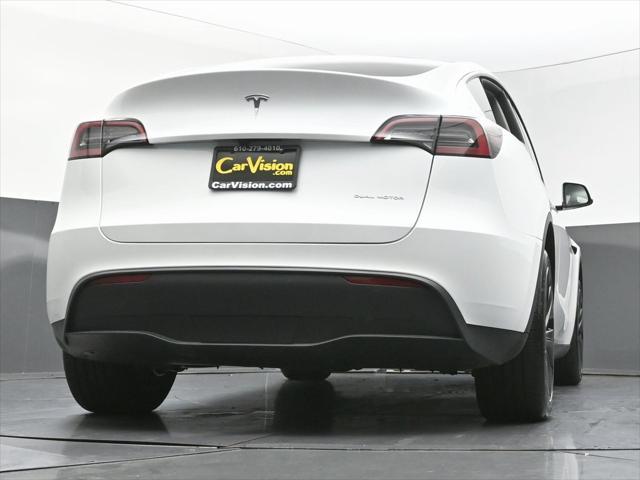 Photo of 2024 Pearl White Multi-Coat Tesla Model Y
