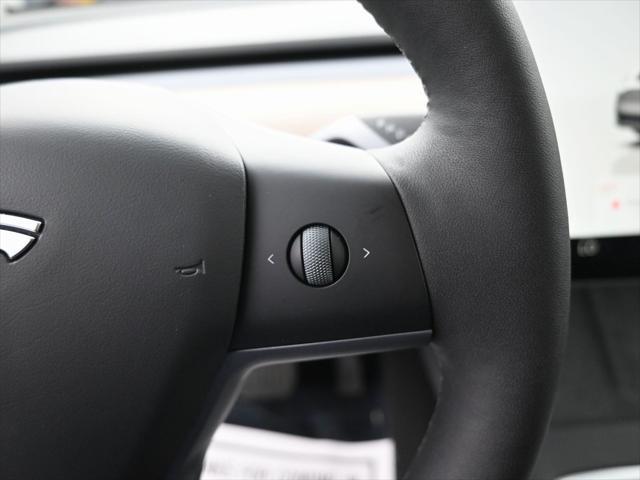 Photo of 2024 Pearl White Multi-Coat Tesla Model Y