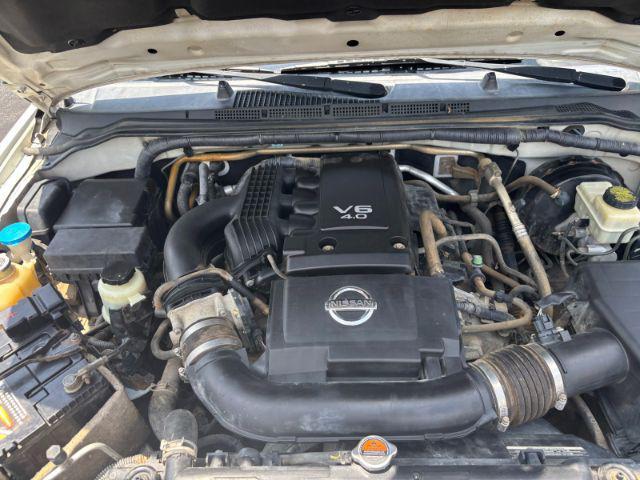 Photo of 2015 Glacier White Nissan Frontier
