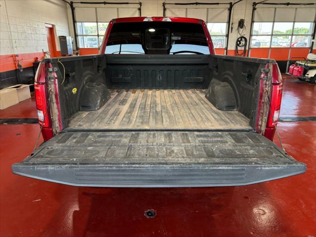 Photo of 2015 Ruby Red Metallic Tinted Clearcoat Ford F-150