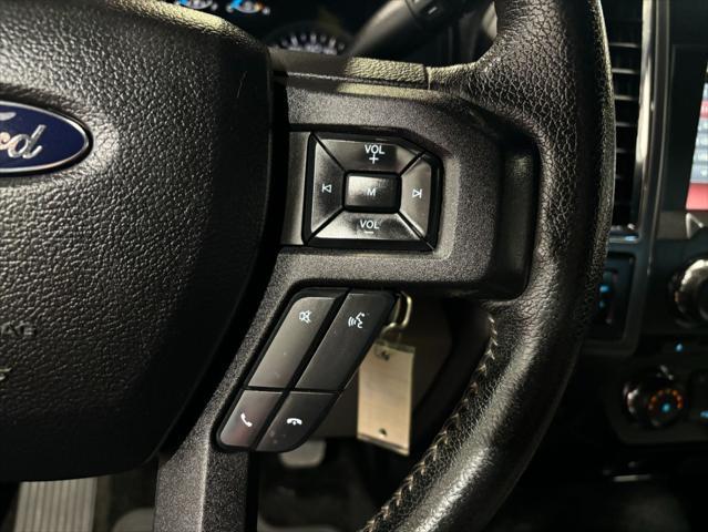 Photo of 2015 Ruby Red Metallic Tinted Clearcoat Ford F-150