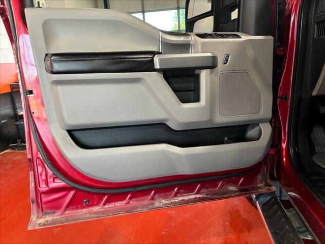 Photo of 2015 Ruby Red Metallic Tinted Clearcoat Ford F-150