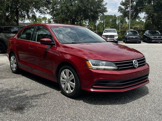 Photo of 2017 Cardinal Red Metallic Volkswagen Jetta