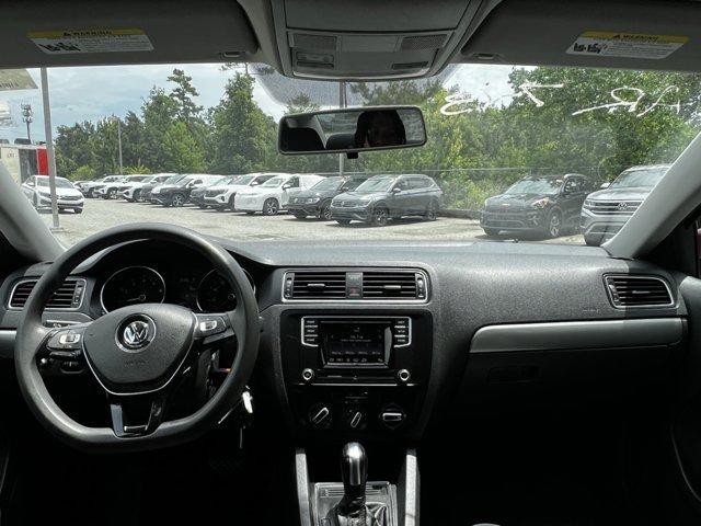 Photo of 2017 Cardinal Red Metallic Volkswagen Jetta