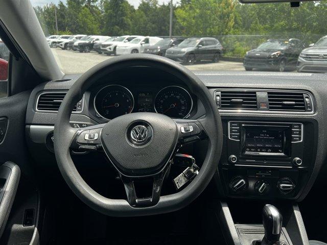 Photo of 2017 Cardinal Red Metallic Volkswagen Jetta