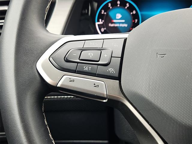 Photo of 2024 Deep Black Pearl Volkswagen Atlas Cross Sport