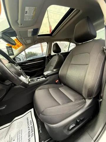 Photo of 2020 Pearl White Tricoat Nissan Altima