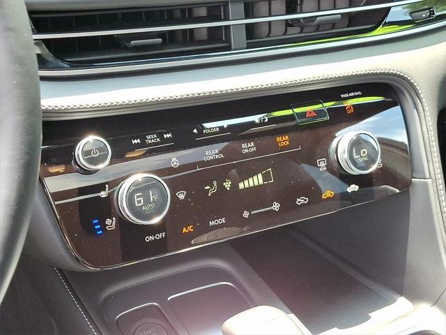 Photo of 2022 Warm Titanium/Black Obsidian INFINITI QX60