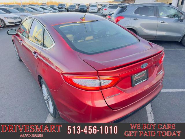 Photo of 2014 MAROON Ford Fusion