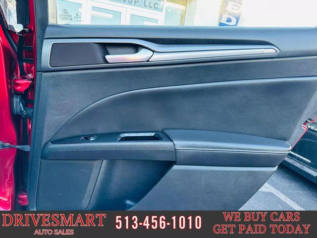 Photo of 2014 MAROON Ford Fusion