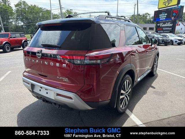 Photo of 2022 Scarlet Ember Tintcoat/Super Black Nissan Pathfinder