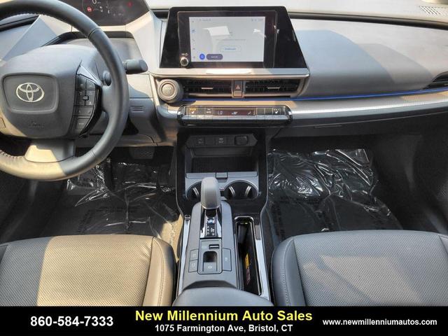Photo of 2024 White Toyota Prius