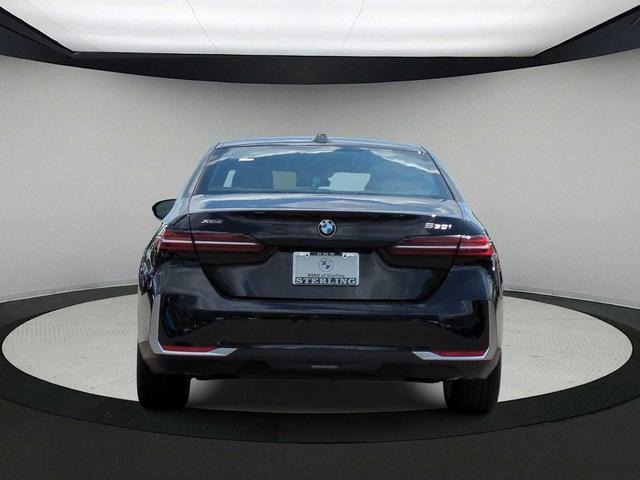 Photo of 2025 Black Sapphire Metallic BMW 530