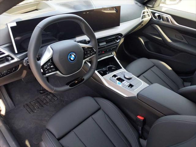 Photo of 2025 Green Metallic BMW i4 Gran Coupe