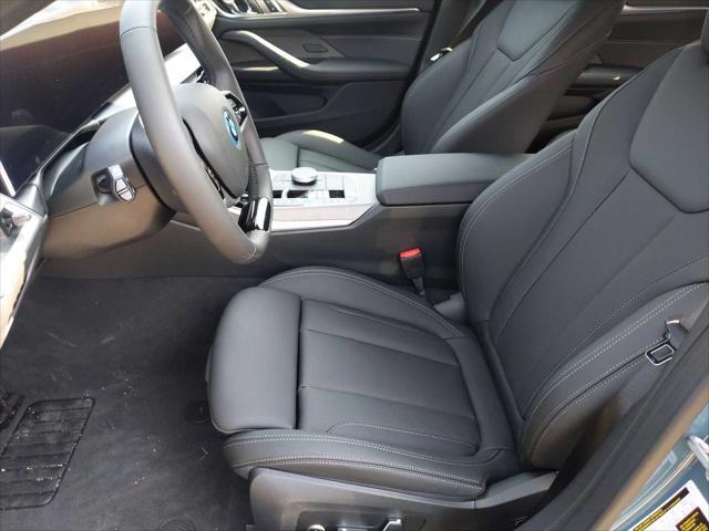 Photo of 2025 Green Metallic BMW i4 Gran Coupe