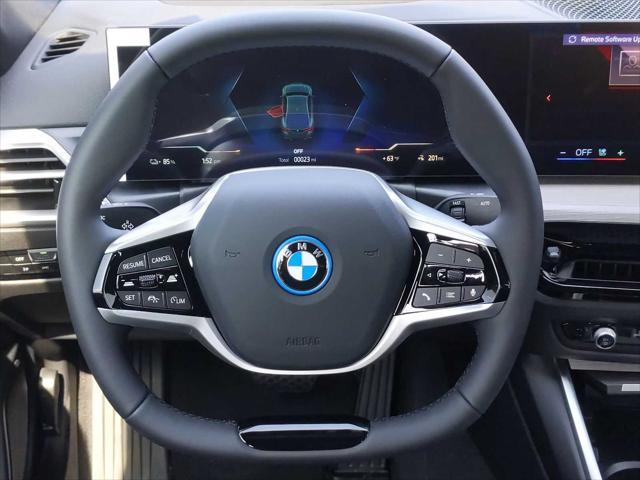 Photo of 2025 Green Metallic BMW i4 Gran Coupe