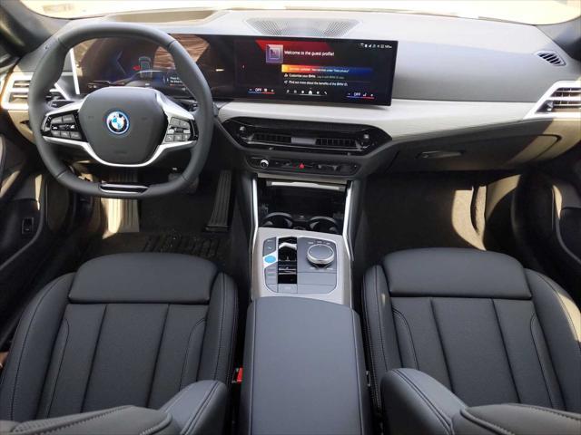 Photo of 2025 Green Metallic BMW i4 Gran Coupe