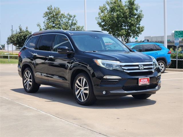 Photo of 2017 Black Honda Pilot