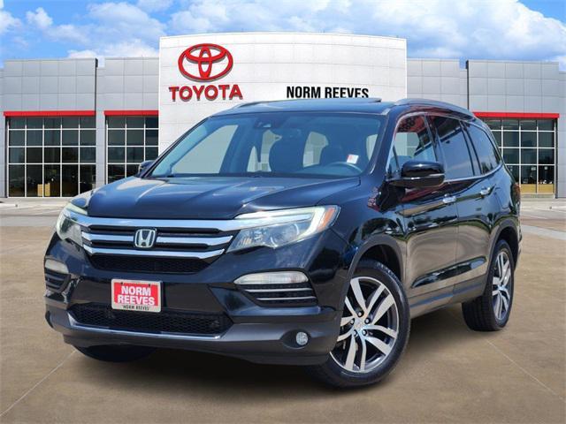 Photo of 2017 Black Honda Pilot