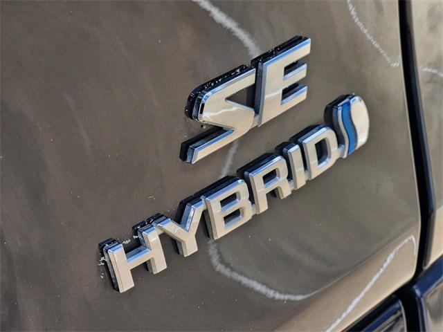 Photo of 2024 Midnight Black Metallic Toyota RAV4 Hybrid