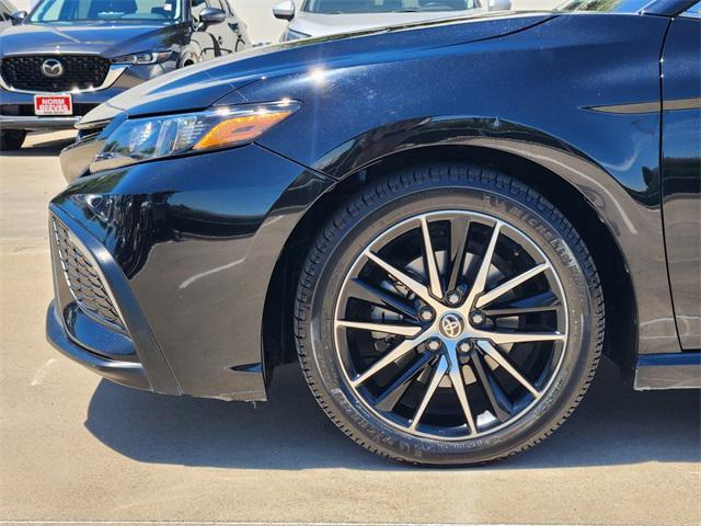 Photo of 2022 Midnight Black Metallic Toyota Camry