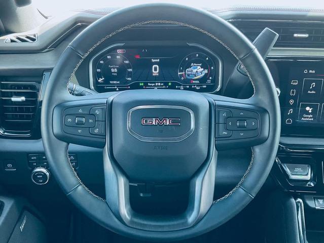 Photo of 2024 Volcanic Red Tintcoat GMC Sierra 2500