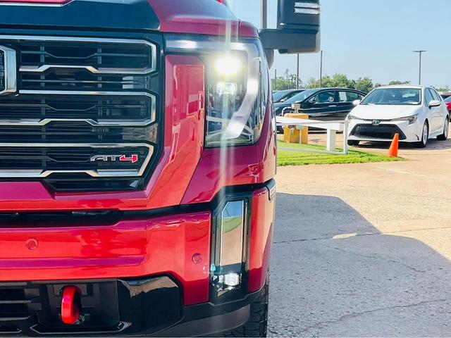 Photo of 2024 Volcanic Red Tintcoat GMC Sierra 2500