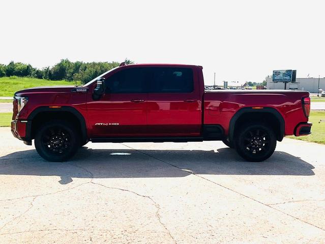 Photo of 2024 Volcanic Red Tintcoat GMC Sierra 2500