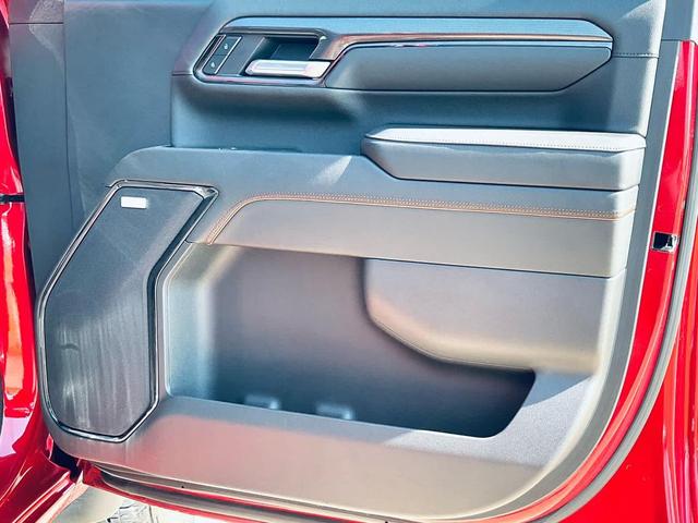 Photo of 2024 Volcanic Red Tintcoat GMC Sierra 2500