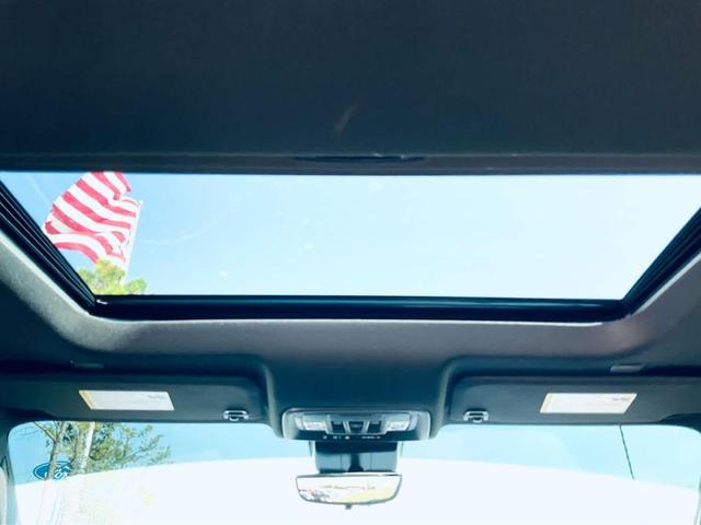 Photo of 2024 Volcanic Red Tintcoat GMC Sierra 2500